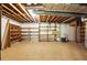 Large unfinished basement featuring shelving and exposed utilities at 2846 Spring Lake Dr, Buford, GA 30519