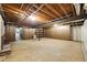 Spacious unfinished basement with exposed ceiling, offering potential for customization at 2846 Spring Lake Dr, Buford, GA 30519