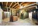 Large unfinished basement with stairs and exposed ceiling, ready to be customized for living at 2846 Spring Lake Dr, Buford, GA 30519