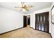 This bedroom includes closet and ceiling fan, providing ample storage and comfort at 2846 Spring Lake Dr, Buford, GA 30519