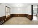Dining room featuring neutral carpet and wainscotting at 2846 Spring Lake Dr, Buford, GA 30519