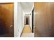 Hallway with neutral carpet and multiple doors at 2846 Spring Lake Dr, Buford, GA 30519