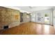Sun room featuring parquet floors, brick wall and plenty of natural light at 2846 Spring Lake Dr, Buford, GA 30519