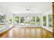 Bright sun room with hardwood floors and plenty of natural light at 2846 Spring Lake Dr, Buford, GA 30519
