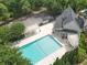 Aerial view of the property featuring a large pool and outdoor entertaining spaces at 3890 The Battery, Duluth, GA 30096