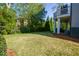 Expansive backyard with lush lawn and mature trees providing privacy at 3890 The Battery, Duluth, GA 30096