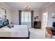 Bedroom with chandelier and an ensuite bathroom at 3890 The Battery, Duluth, GA 30096