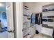 Walk-in closet with organized shelving with bedroom view at 3890 The Battery, Duluth, GA 30096