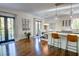 Open concept with dining area near a breakfast bar and access to the outdoor deck at 3890 The Battery, Duluth, GA 30096