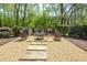 Charming backyard fire pit area with seating, perfect for outdoor gatherings and relaxation at 3890 The Battery, Duluth, GA 30096
