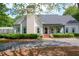 Inviting front exterior of a beautiful home with manicured landscaping at 3890 The Battery, Duluth, GA 30096
