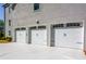 Spacious three-car garage showcasing clean lines and classic design, offering ample parking and storage at 3890 The Battery, Duluth, GA 30096
