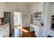 Chic kitchen featuring a desk, marble countertops, stainless steel appliances, and hardwood floors at 3890 The Battery, Duluth, GA 30096