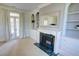 Main bedroom features a fireplace, built-in shelving, and French doors leading to a private balcony at 3890 The Battery, Duluth, GA 30096