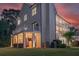 Rear exterior of home showcasing balconies and an outdoor living area at 3890 The Battery, Duluth, GA 30096