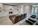 Home theater boasts reclining chairs, a fireplace, built-in shelving, and access to the patio at 3890 The Battery, Duluth, GA 30096