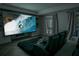Home theater featuring a large screen, tiered seating, and ambient lighting at 3890 The Battery, Duluth, GA 30096