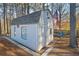 Exterior view of the shed featuring an American flag and brick lined entrance at 436 Suwanee East Dr, Lawrenceville, GA 30043