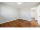 Bedroom with hardwood floors and neutral walls at 8586 Taylor Rd, Riverdale, GA 30274