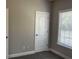 Bedroom featuring new carpeting and a window at 106 Creek Crossing Ln, Temple, GA 30179