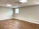 Finished room with modern flooring, lighting and neutral colors at 106 Creek Crossing Ln, Temple, GA 30179