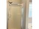 Walk-in shower with glass enclosure and chrome hardware at 106 Creek Crossing Ln, Temple, GA 30179