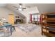 Spacious bonus room offering vaulted ceilings, a ceiling fan, and flexible living space at 120 Chastain Nw Rd # 608, Kennesaw, GA 30144
