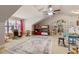 Bedroom showcasing a desk near the window, a ceiling fan, and a large patterned rug at 120 Chastain Nw Rd # 608, Kennesaw, GA 30144