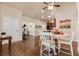 Bright dining area with hardwood floors and a view into the kitchen at 120 Chastain Nw Rd # 608, Kennesaw, GA 30144