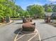 Community entrance with brick pillars and a well-maintained landscape at 120 Chastain Nw Rd # 608, Kennesaw, GA 30144