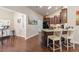 Kitchen view with hardwood floors, granite counters and stainless steel appliances at 120 Chastain Nw Rd # 608, Kennesaw, GA 30144