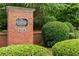 Brookhaven of East Cobb entrance sign with brick surround and manicured landscaping at 120 Chastain Nw Rd # 608, Kennesaw, GA 30144