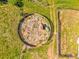 Overhead image of a circular corral on a well-maintained farm property at 1288 Reavesville Rd, Bowdon, GA 30108
