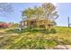 Charming log home with a large yard, deck, and walkout basement at 1288 Reavesville Rd, Bowdon, GA 30108
