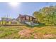 Charming log home with a large yard, deck, and walkout basement at 1288 Reavesville Rd, Bowdon, GA 30108