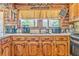 Kitchen area showing sink, cooking appliances and food preparation area at 1288 Reavesville Rd, Bowdon, GA 30108