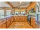 Well-lit kitchen with wood counters, stainless steel appliances, and a breakfast bar at 1288 Reavesville Rd, Bowdon, GA 30108