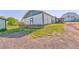 Scenic view of white buildings with green trim and a white barn in the background at 1288 Reavesville Rd, Bowdon, GA 30108