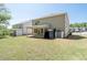 A spacious backyard with a covered patio at 1815 Wellston Dr, Lawrenceville, GA 30043