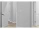 A standard hallway showing multiple doors at 1815 Wellston Dr, Lawrenceville, GA 30043