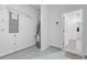 Utility room with mechanical equipment, electrical panel, and access to the outside at 1815 Wellston Dr, Lawrenceville, GA 30043