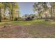 Extensive backyard featuring a deck, fenced perimeter, and room for activities at 209 Red Fern Ct, Canton, GA 30114