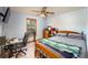 Bright bedroom with natural light, desk, and hardwood bed frame at 209 Red Fern Ct, Canton, GA 30114