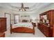 Comfortable bedroom with a decorative ceiling and furnishings at 209 Red Fern Ct, Canton, GA 30114