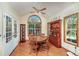 Bright dining area with a round table and large windows, offering ample natural light at 209 Red Fern Ct, Canton, GA 30114