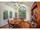 Bright dining area with a round table and large windows, offering serene views at 209 Red Fern Ct, Canton, GA 30114