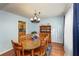 Dining room with a wooden table and chairs, plus stylish decor at 209 Red Fern Ct, Canton, GA 30114