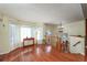 Open foyer with hardwood floors, chandelier, and staircase to the upper level at 209 Red Fern Ct, Canton, GA 30114