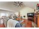 Spacious living room with hardwood floors, a fireplace, and stairs to the second floor at 209 Red Fern Ct, Canton, GA 30114