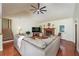 Comfortable living room featuring a vaulted ceiling and a cozy stone fireplace at 209 Red Fern Ct, Canton, GA 30114